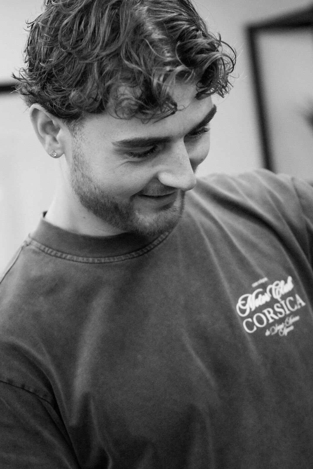 Black and white portrait of one of the Profile barbers